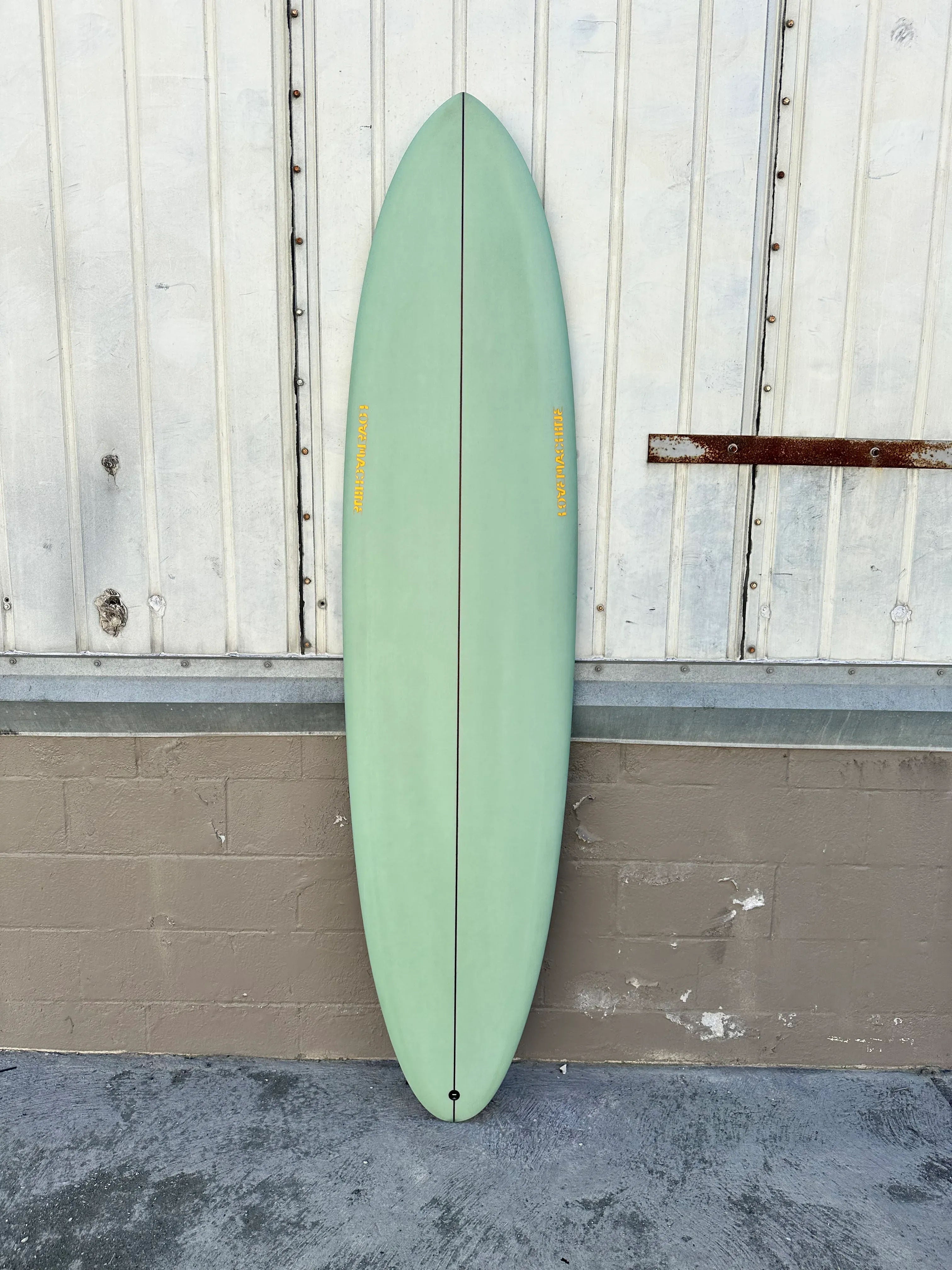 Sage green store surfboard