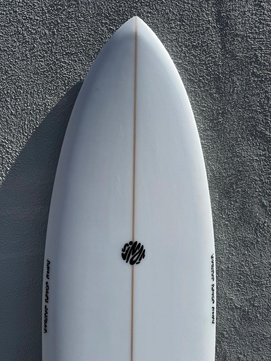 Simon Jones Designs | 6’2” Tracks Twinny Clear Surfboard